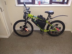 One of a kind! Customised Specialised electric bike on a throttle 52 volt battery and 72 volt motor adaptable controller for 48 volt+, Built in Alexa second gen. Solar panel for charging your phone. Front light runs on a battery battery pack that is included, also bike charger is included. no bike chan installed but I have one you can install. Current speed 31 mph.